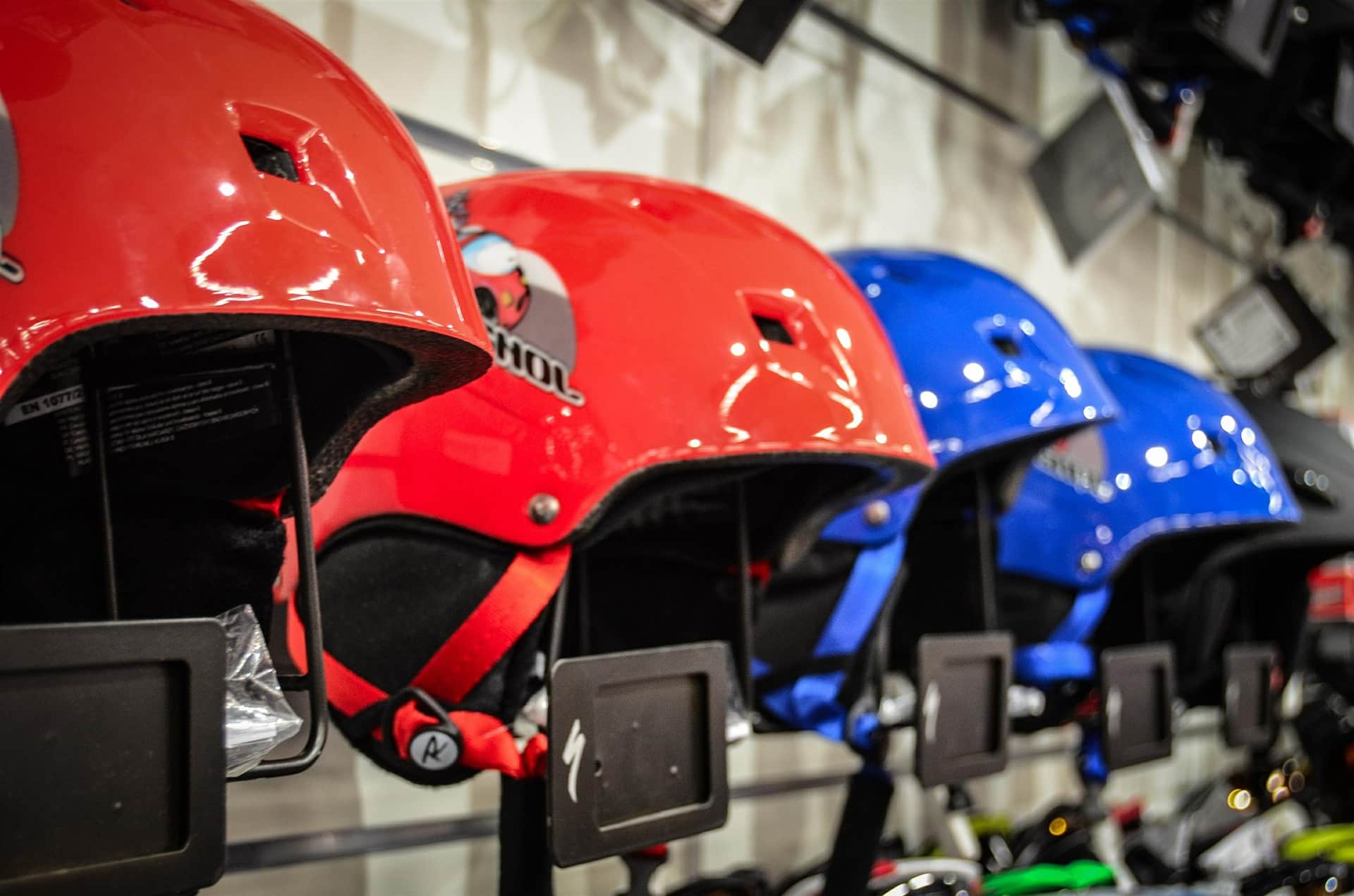 Row of red and blue ski helmets